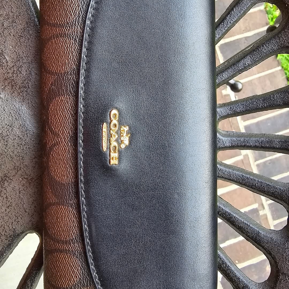 Coach Signature Trifold Saddle Wallet